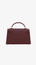 Load image into Gallery viewer, CHARLES &amp; KEITH Tricha Knotted-Belt Top Handle Bag - Wineberry Red
