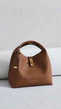 Load image into Gallery viewer, CHARLES &amp; KEITH Chance Turn-Lock Bucket Bag - Chocolate
