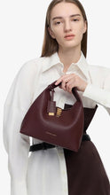 Load image into Gallery viewer, CHARLES &amp; KEITH Chance Turn-Lock Bucket Bag - Wineberry Red
