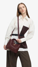 Load image into Gallery viewer, CHARLES &amp; KEITH Chance Turn-Lock Bucket Bag - Wineberry Red
